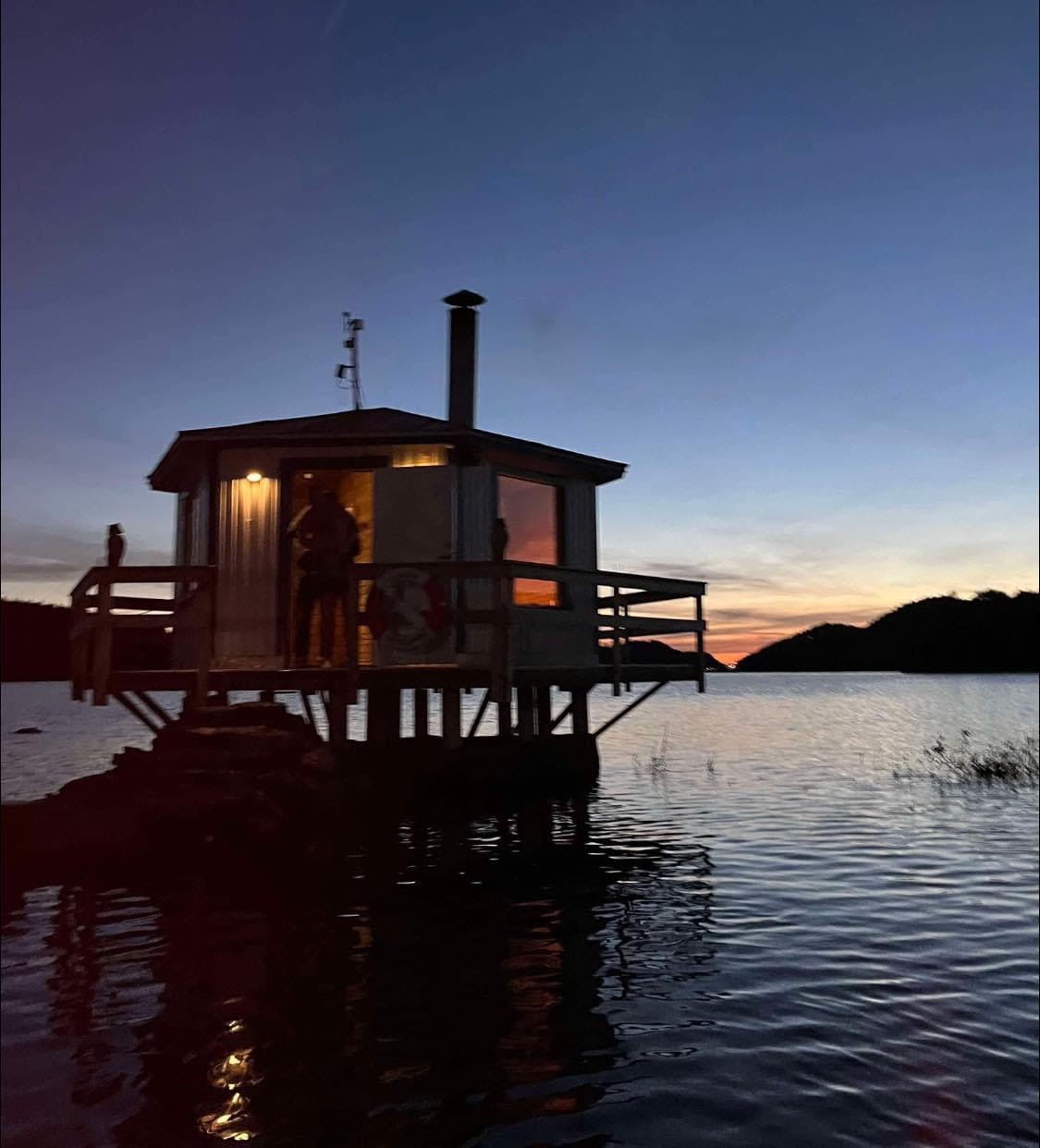 Bastun vid Viaredssjön i solnedgång
